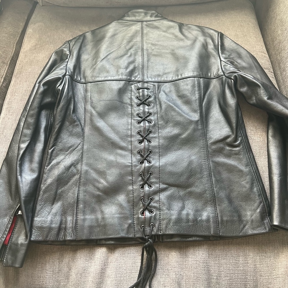 Gorgeous like new corset back black leather jacket by JL leathers